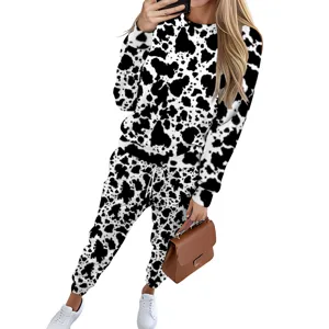 Casual long-sleeve two-piece sweat suit set with trendy black and white cow print
