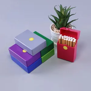Colorful plastic cigarette cases showing stackable storage and pop-up opening detail.