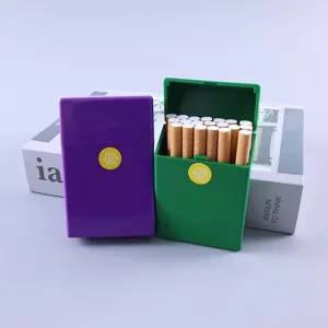 Plastic cigarette case detail showing 20-pack pop-up flip cover storage box in purple and green.