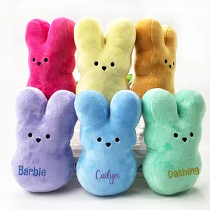 Detailed view of colorful custom Easter bunny plushies with personalized names