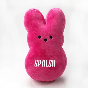 Macro view of soft pink plush Easter bunny featuring personalized white text SPALSH
