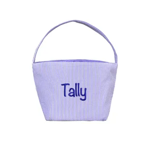 Detailed view of striped seersucker Easter basket with custom 'Tally' embroidery.