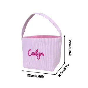 Personalized pink seersucker Easter basket with custom embroidered name and handle
