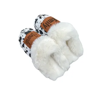 Custom warm cow print fuzzy slippers with personalized names Amanda and Emily
