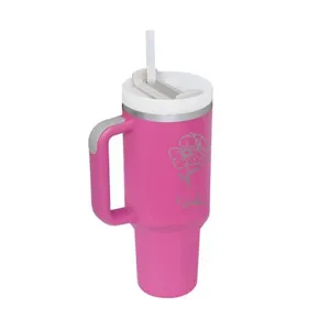 Pink stainless steel tumbler with custom floral engraving and name Viola details