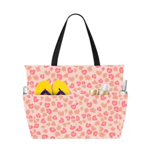 Detail of large capacity waterproof beach tote bag with pink heart leopard print.