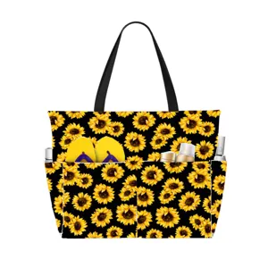 Large sunflower print beach bag featuring multiple external pockets for travel and pool use.