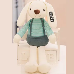 Close-up of cute plush bunny with custom name 'CHERRY' embroidered on long ear