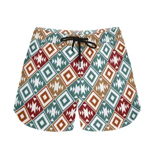 Close-up of casual shorts featuring a colorful Southwestern geometric tribal pattern.