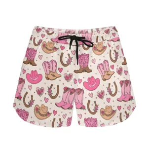 Detailed view of western cowgirl pattern with pink boots and hats on casual sports shorts