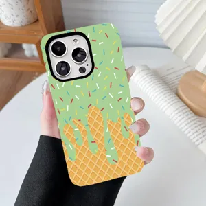 Detailed view of fashion ice cream pattern phone case held by hand in cozy home setting