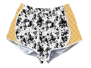 Detailed view of women's casual sports shorts featuring cow print and waffle pattern