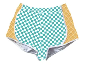 Detailed view of summer sports shorts with teal checkered print and waffle cone patterns