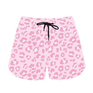 Close-up of pink leopard print summer sports shorts with black drawstring