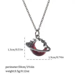 Detail of a Gothic style red crescent moon pendant necklace with pearls and star charms