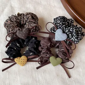 French style leopard and floral scrunchies with cute heart charm and ribbon tie for sweet hair styling.