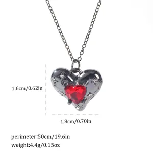Macro detail of a gothic heart pendant necklace showing dimensions and weight metrics.