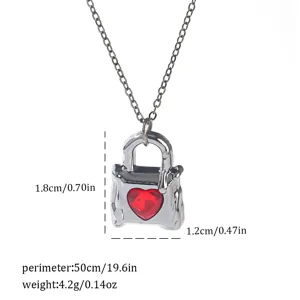 Detail of Gothic necklace pendant showing dimensions and red heart gemstone insert