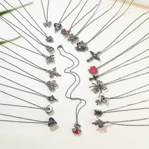 Collection of gothic necklaces with spider, heart, and cross pendants for Halloween