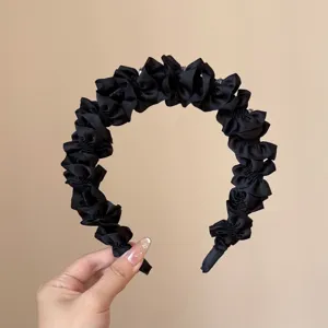 Zwarte geplooide stoffen haarband voor vrouwen, elegante golvende antislip haarhoepel voor dagelijks.