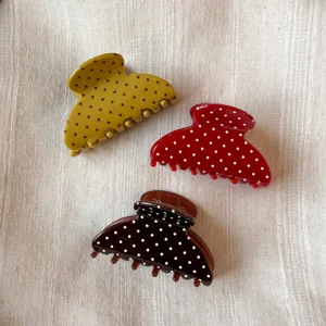 French acetate polka dot hair claw detail, elegant retro style hair accessory for women daily styling.
