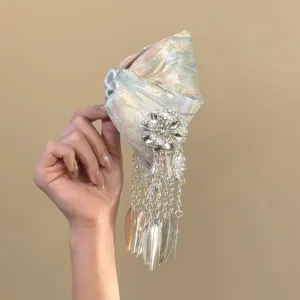 Exquisite Chinese style hair claw clip with floral rhinestones and long metallic tassels.