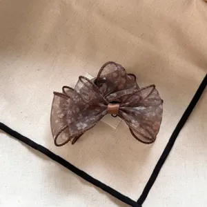 Brown floral sheer organza bow hair claw clip detail view, elegant hair accessory