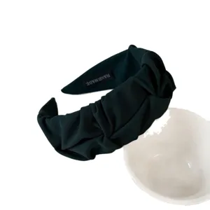 Dark green pleated wide headband for women, chic fabric hair hoop fashion accessory.