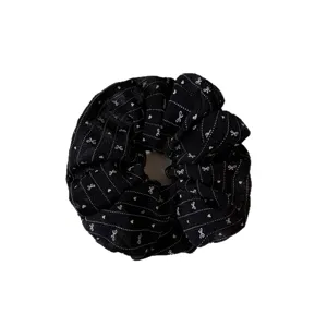Elastico per capelli nero con motivi di fiocchi bianchi, elegante elastico per coda di cavallo