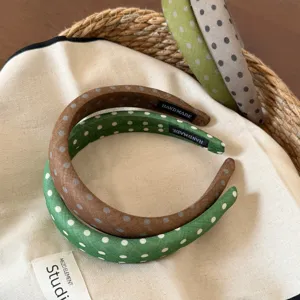Green and brown polka dot wide fabric headband, Korean style trendy hair accessory for women.