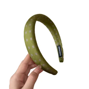 Green polka dot wide headband, lightweight fabric hair hoop for daily fashion styling and comfort.