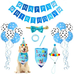 Pet birthday party detail shot showcasing blue polka dot balloons, hat, and cute bandana.