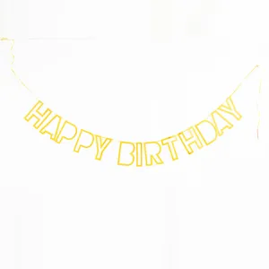 Detail view of gold glitter happy birthday letter banner, perfect for party wall decor.