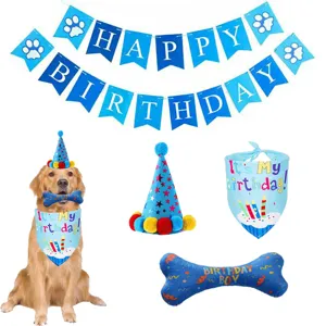 Blue dog birthday party supplies set including banner, hat, bandana, and squeaky toy.