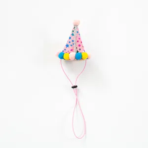 Cute pink pet birthday party cone hat with colorful pom-poms and stars for cats and dogs.
