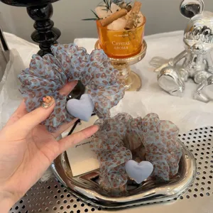 Korean blue leopard print hair scrunchie with cute heart charm, elegant hair accessory for women.