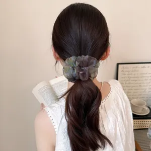 Korean style brown tie-dye mesh hair scrunchie detail shot, perfect for chic ponytail styling.