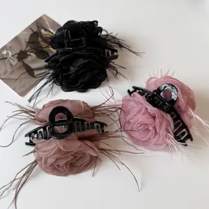 Elegant organza rose flower hair claw clip with delicate feathers for sweet daily hair styling.