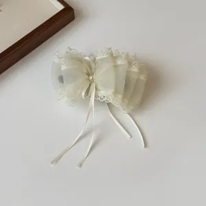 Elegant mesh bow hair claw clip with delicate lace and pearl detail for women's hairstyle.