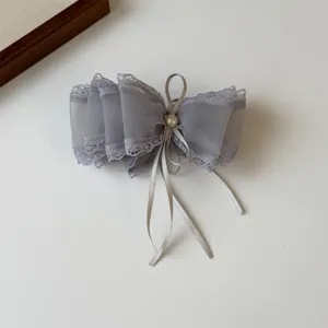 Grey mesh bow hair clip with lace trim, elegant pearl accent, and cute ribbon detail.