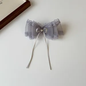 Grey mesh bow hair clip with lace and pearl, elegant hairpin detail for daily wear.