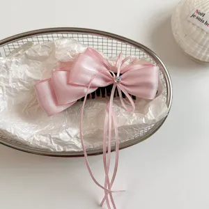 Korean sweet pink satin ribbon hair claw clip bow elegant banana clip close up view