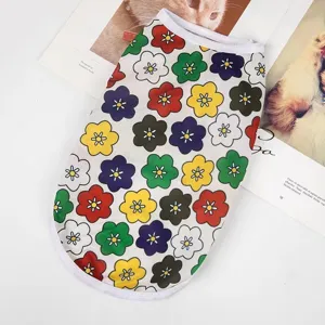 Pet dog cooling vest detailed shot showing colorful floral print mesh fabric and soft white trim.