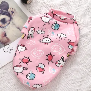 Cute pink fleece pet winter sweatshirt for dogs and cats, featuring playful cartoon doodle print.
