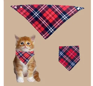 Detail view of red plaid pet bandana scarf with snap buttons for cats and dogs decoration