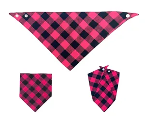Detailed view of the pink and black buffalo plaid pet bandana with convenient snap buttons.