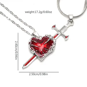 Detailed view of the heart pierced by sword pendant necklace, silver metal finish closeup.