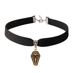 Goth style choker detail with black velvet strap and alloy coffin pendant, gothic alternative accessory.