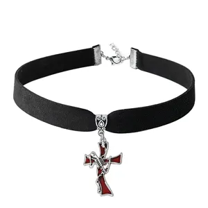 Detail shot of black velvet choker necklace featuring silver skeleton cross pendant dark style.