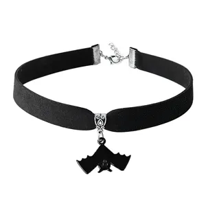 Close-up of black velvet choker necklace with silver metal alloy and cute bat pendant detail.